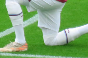 West Ham United footballer, Jesse Lingard taking a knee before the Premier League game against Southampton at the London Stadium, May 2021.