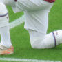 West Ham United footballer, Jesse Lingard taking a knee before the Premier League game against Southampton at the London Stadium, May 2021.